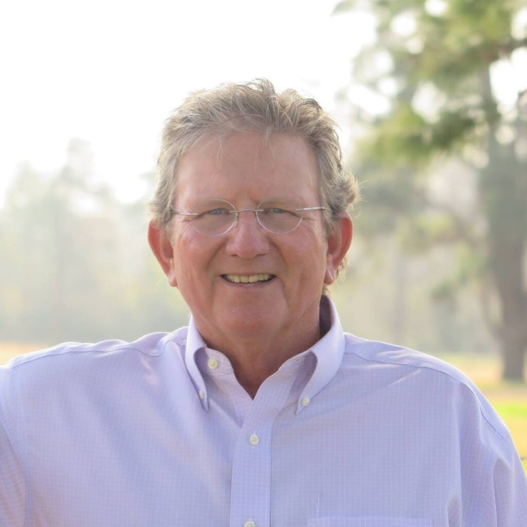 Sonny Tunstall with glasses and light gray hair wearing a light blue button-down shirt East Texas
