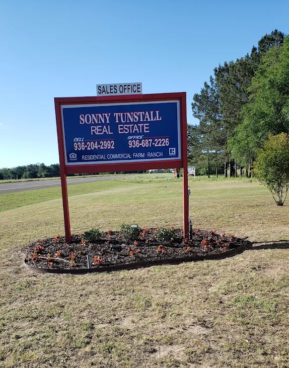 Sonny Tunstall Real Estate sales office sign, cell 936-204-2992, office 936-687-2226, residential commercial farm ranch